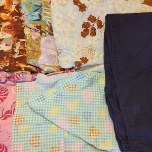 Scrub bundle. Size 2 XL shirts and pants are size 18.